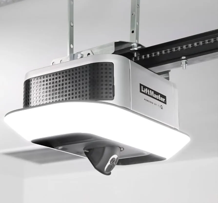 Chain-drive garage door opener mounted on a residential garage ceiling